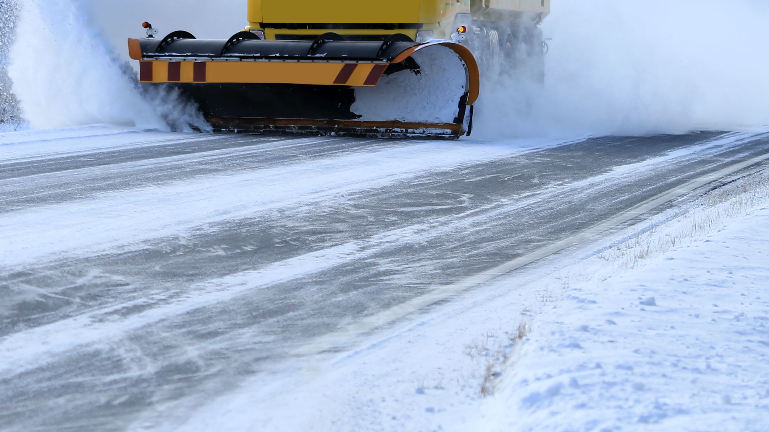 snow plow on the road