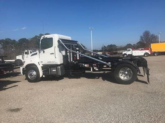 multi-use roll-off truck